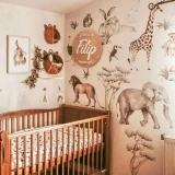 naklejki-nascienne-savanna-wonderland-slon-lew-zyrafa.webp